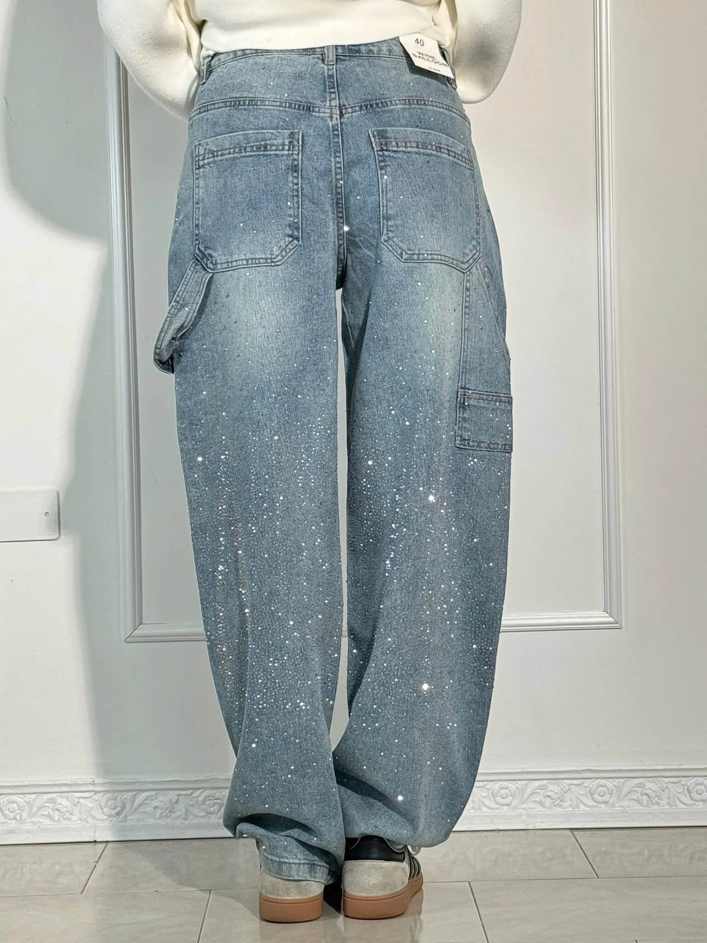 Calypso | Pantalon taille haute à jambes larges et poches à boutons